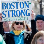 Permalink to Tribute to victims, survivors, responders planned on anniversary of Boston bombings Ottawa runner Shelley Baran holds a sign in tribute to the Boston Marathon bombings at the US Embassy in Ottawa. (The Canadian Press/Justin Tang)