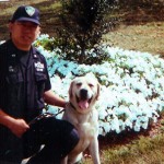 Permalink to David Lim, PANYNJ Officer & 9/11 Survivor, To Retire Thursday David Lim and dog Sirius (Credit: PANYNJ)