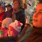 Permalink to Charleston Resident Turns Home into Winter Wonderland to Help Children Fight Cancer Children admire DiMartino's display. Photo NY1