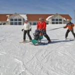 Permalink to A first for Annie’s House Gary Nelson, center, controls a bi-ski carrying a boy on the slope in front of Annie's House, the new chalet and adaptive skiing center named for his daughter, Ann Nicole Nelson. At left is Sherry McCabe and at right is Frank LaQua.