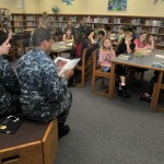 Permalink to USS New York Sailors Judge School Invention Convention Hospital Corpsman Danielle Tannous and Hospital Corpsman 2nd Class Thionta Buckner from amphibious transport dock ship USS New York (LPD 21) reads to a group of students at the Jacksonville Beach Elementary (JBE) School Invention Convention. Photo by MC3 Angus Beckles