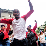 Permalink to Insurance execs take to streets to help museum Guardian Life employees dancing June 11 at a “Flash Event” to bring attention to the Police Museum. Downtown Express photo by Zach Williams