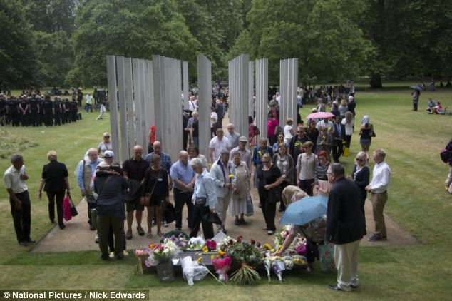 Families of those killed in the 7/7 attacks on London nine years ago lay flowers on the memorial in Hyde Park