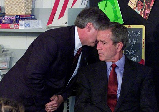 In this September 11, 2001 file photo, President Bush's Chief of Staff Andy Card whispers into the ear of the President to give him word of the plane crashes into the World Trade Center, during a visit to the Emma E. Booker Elementary School in Sarasota, Fla. Photo: Doug Mills, AP