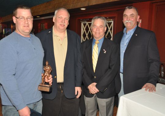From left: Andrew A. Fredericks Instructor of the Year Curt Wicks; Bob Murdock of the Hillcrest Fire Department; County Executive Ed Day; Frank Jewett of the Nyack Fire Department. Photo Tom Bierds