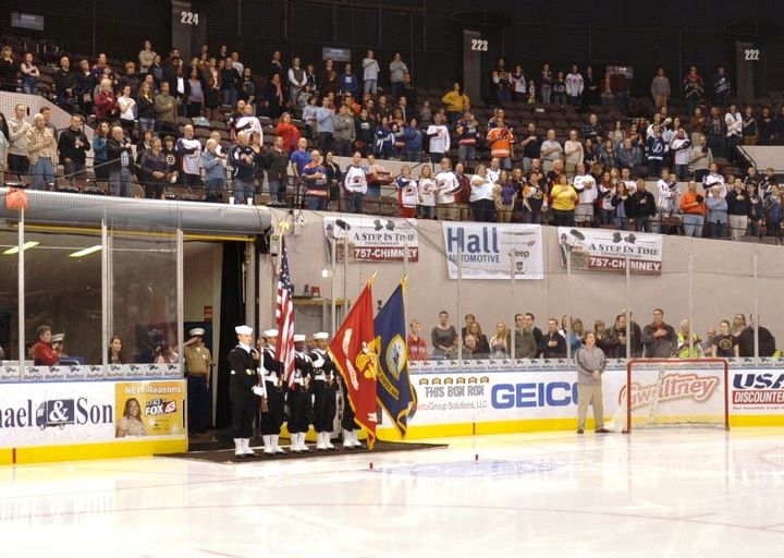 Amphibious transport dock USS Arlington’s (LPD 24) color guard detail made their first public appearance at a Norfolk Admirals hockey game at Scope Arena on March 30, 2013. Arlington will be commissioned on April 6, 2013 and homeported in Norfolk.