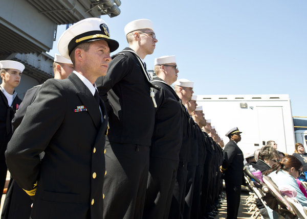 Sailors assigned to the newly commissioned amphibious transport dock USS Arlington (LPD 24) stand by to bring the ship to life during the ship's commissioning ceremony at Naval Station Norfolk. As the third Navy vessel to bear the name, Arlington commemorates the lives lost and the heroism demonstrated the aftermath of 9/11. (U.S. Navy photo by Mass Communication Specialist 3rd Class Frank J. Pikul/Released)