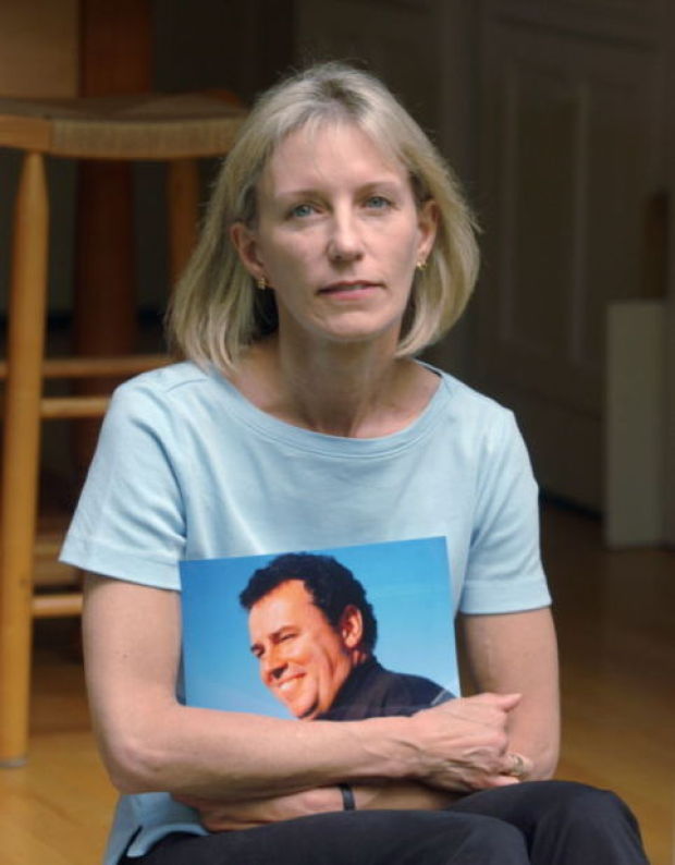 Beverly Eckert, 50, of Stamford, Conn., died in the 2009 crash. Here she holds a picture of husband Sean Rooney, who was killed in the September 11, 2001, World Trade Center attack.Douglas Healey, The Associated Press