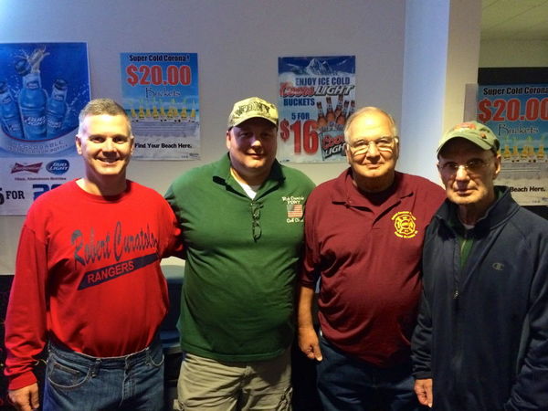 The Robert Curatolo Bowl-a-thon included numerous family members of the hero firefighter, including, left to right, brothers Anthony Curatolo and John Curatolo, his father, Tony Curatolo and uncle, Chick Curatolo. Photo  Charlie De Biase Jr.