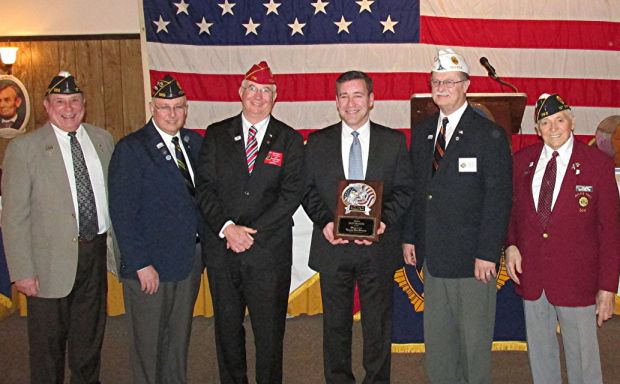 Don Bacso, fourth from left, receives American Legion Post 369's Americanism Award from, from left, Ernest Komasinski, Martin Dzieglowicz, Bob Newman, Ed Trice, and Stanley Nalewski. Provided by Joanne Kuss