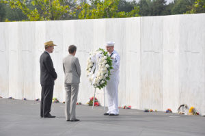 USS Somerset crew member Matthew Konchan presents a wreath at the Flight 93 National Memorial, near Shanksville, Pa., Wednesday to Gordon Felt, president of the Families of Flight 93, and Sally Jewell, secretary of the United States Department of Interior. Brian Whipkey, Daily American