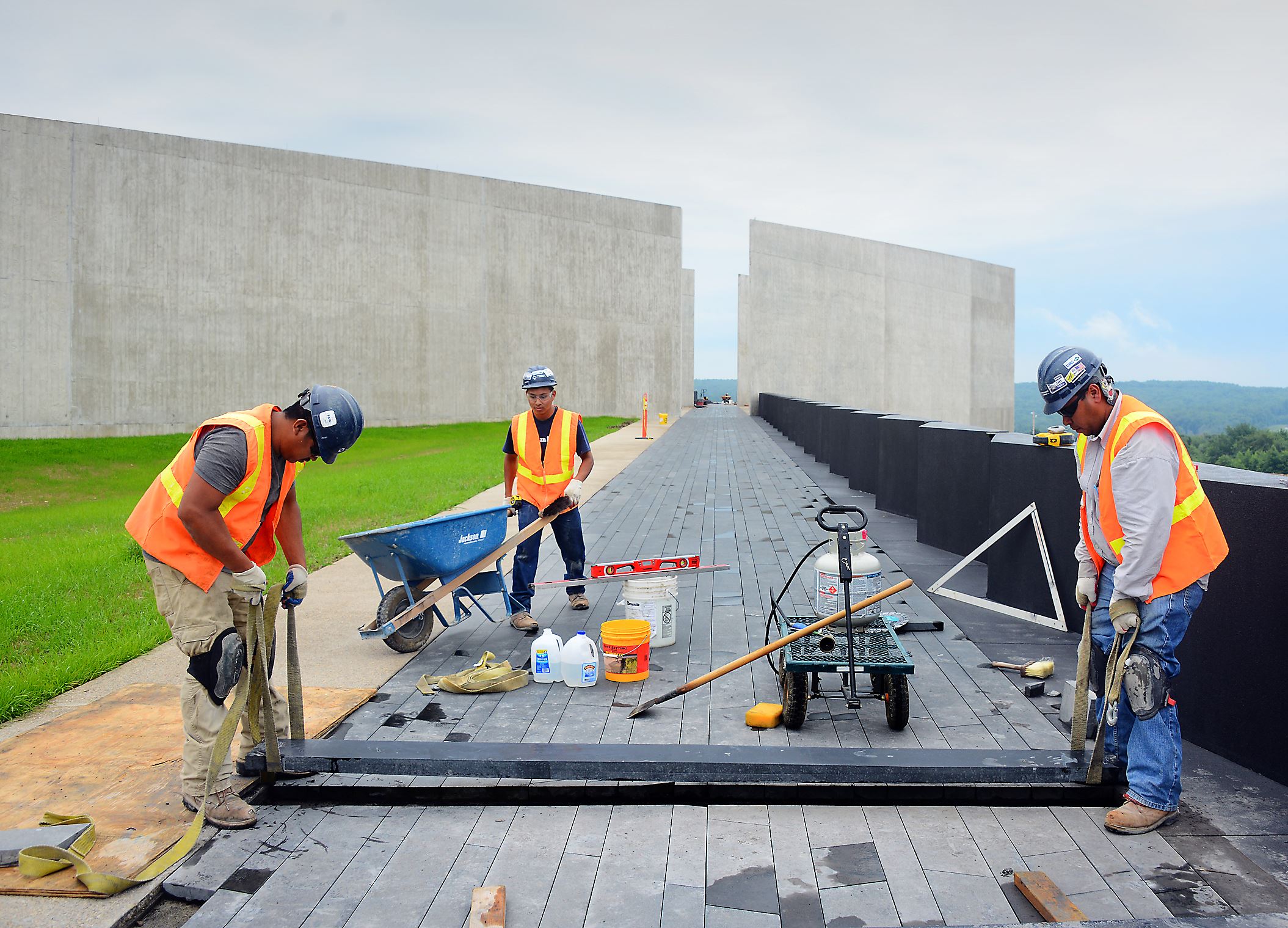 Contractors continue work on a black granite walkway at the site of the Flight 93 National Memorial visitor center. The walkway marks the flight path of the hijacked plane before it crashed.Lake Fong Pittsburgh Post-Gazette