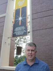 Jim Ransdell stands with the 9/11 Memorial he designed. (Photo: Melissa Stewart/The Community Recorder)