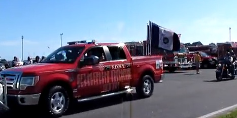 A pick-up truck driven by two New Jersey men, recently indicted on theft charges, leaves Lewes in 2011 among a group who rode and drove in memory of 9/11. Courtesy of: YouTube