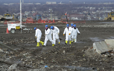This 2002 photo shows forensic workers at the former Fresh Kills landfill, months after the 9/11 terror attacks.(Staten Island Advance/Jan Somma-Hammel)