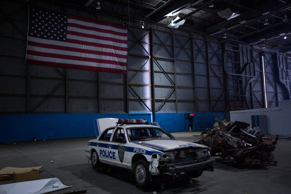 Other September 11 artifacts are also stored in Hangar 17, including Port Authority Police Department vehicles. Credit Mark Kauzlarich/The New York Times