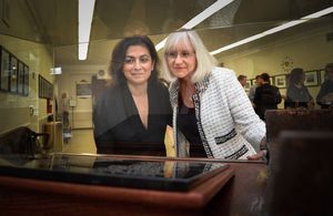 Manhasset resident Armine Giorgetti and North Hempstead Town Supervisor Judi Bosworth view the new September 11 memorial at Town Hall, which features a piece of the destroyed World Trade Center buildings, following the town’s remembrance ceremony Friday.