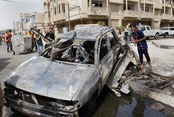 Bombs tear through Baghdad, killing 56: Attack goes off Tuesday morning in a spasm of violence on the eve of the 10th anniversary of the U.S.-led invasion.