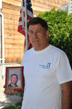 Jim Giaccone, 53, holds a photo of his brother Joseph, who worked for Cantor Fitzgerald.Photo: Dennisthephotog.com