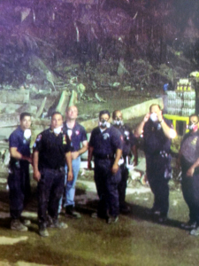 John P. McKee (third from left) with fellow workers after the attacks.