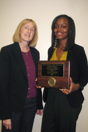 Berkeley College Provost Marianne Vakalis, presents Tiana Wilkins of Ossining with the 2013 Massari Scholarship.Photo Credit: Contributed