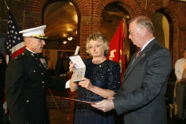 Karen and John J. McKenna III accepted a Silver Star for their late son. Jeremy Bales