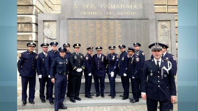 NYPD officers attend funerals of Paris police officers killed in the Charlie Hebdo terrorist attack. Photo NY1