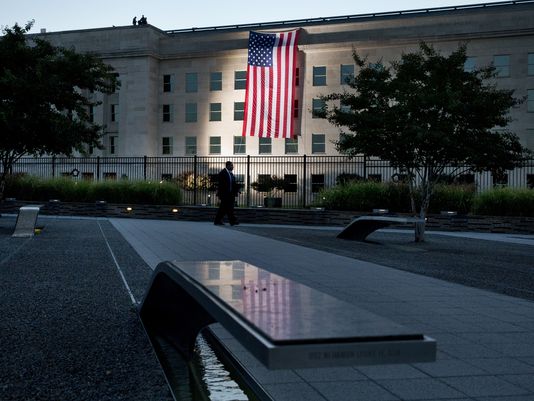 The Pentagon Memorial at night Photo: Jacquelyn Martin AP