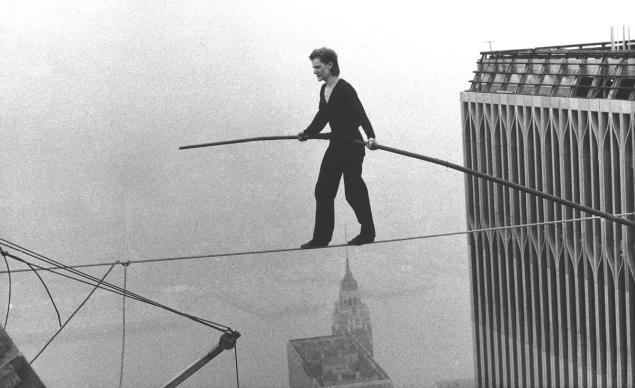Philippe Petit, a French high wire artist, walks across a tightrope suspended between the World Trade Center's Twin Towers. New York, Aug. 7, 1974. Alan Welner/AP