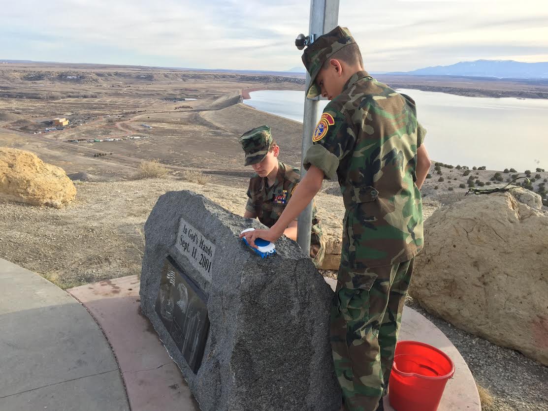 Pueblo Young Marines tend the Liberty Point 9/11 Memorial. Photo KOAA 5.