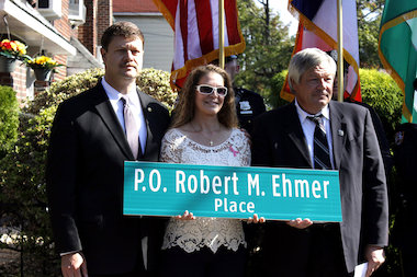 Sign for P.O. Robert M. Ehmer Place. photo DNAInfo