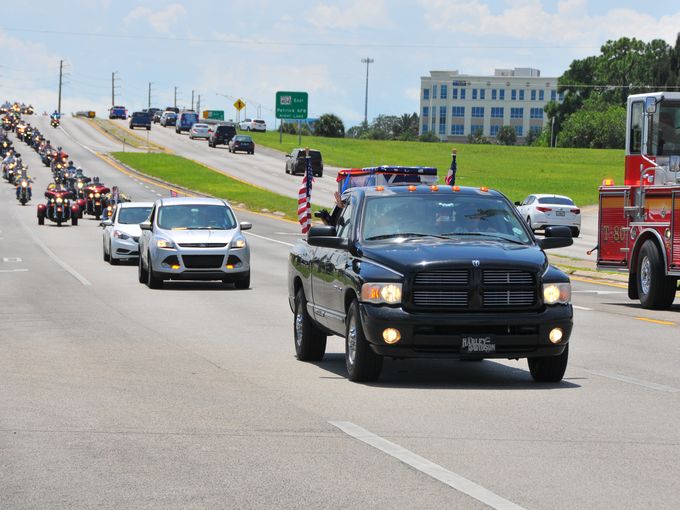 The procession through Brevard County, following a seven-foot, one-ton I-beam from the World Trade Center as the group made its way to at Kennedy Space Center. Photo Malcolm Denemark Florida Today
