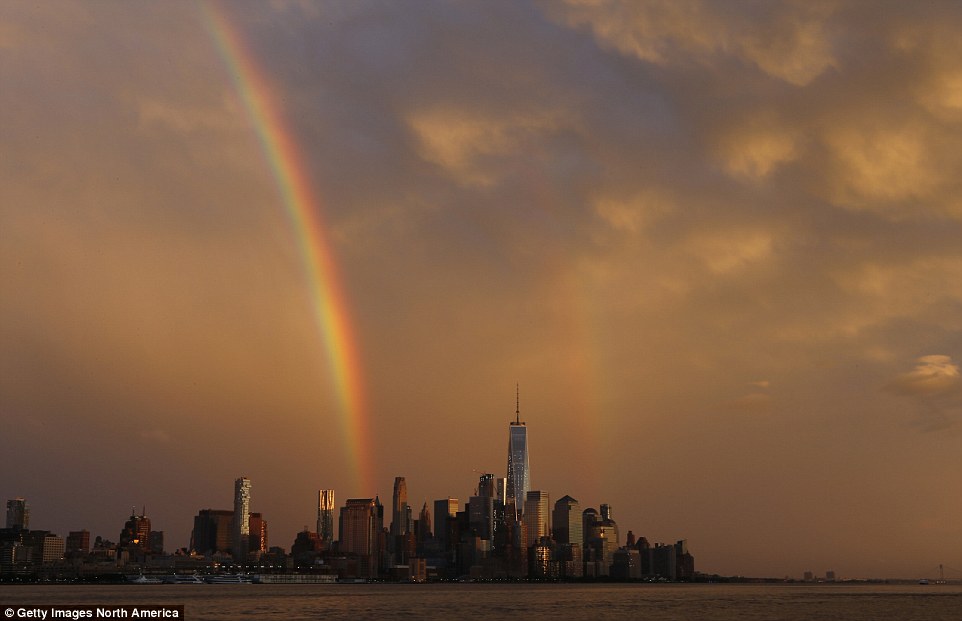 Rainbows: The New York sky had cleared to show a double rainbow Sunday night as the Severe Thunderstorm Warning was cancelled