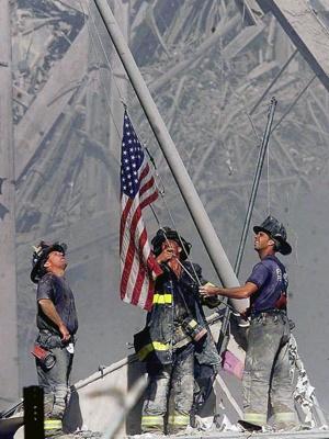 This iconic image was seen as too “vehemently” American by some 9/11 Museum staffers. AP / Copyright 2001, The Record / Thomas E. Franklin