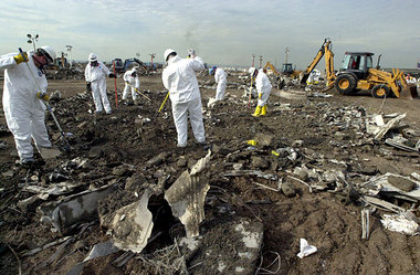 Investigators sift through World Trade Center debris at the Fresh Kills landfill in this photo from Sept. 18, 2001, just a week after the terror attacks. (Staten Island Advance/Irving Silverstein) Historic look at the World Trade Center sifting operation at the Fresh Kills Landfill gallery (18 photos)