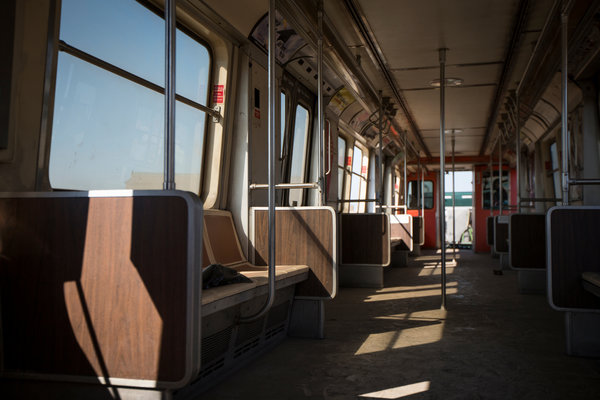 Inside dusty car No. 745, with its orange walls, brown plastic bucket seats and wood-grain partitions. Credit Mark Kauzlarich/The New York Times