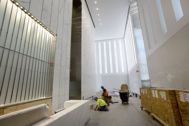  Workers put the final touches on the lobby of 1 World Trade Center in August. Mark Lennihan/The Associated Press