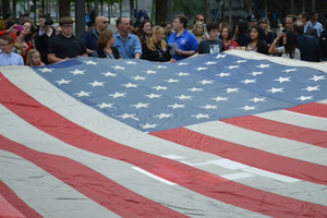 The National 9/11 flag is shown prior to placement. Photo by Kathy Magrane/Firehouse staff