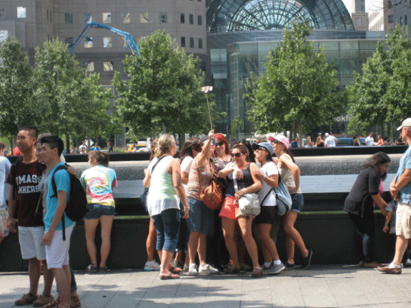 Posing for selfies at the 9/11 Memorial.Photo by Dusica Sue Malesevic