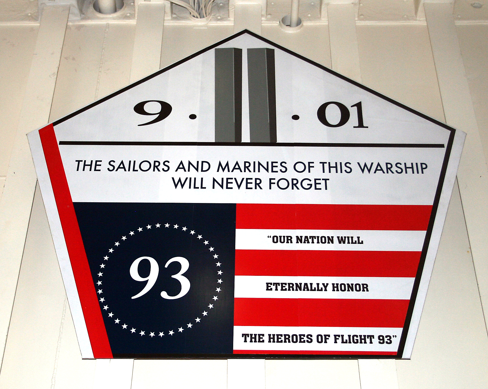 Each of the 9/11 ships has this shield, incorporating visual elements of the Pentagon, the World Trade Center and Flight 93. (photo Walter G. Meyer)