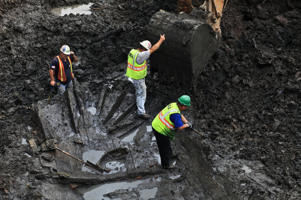 Archaeologists excavating the remnants of an 18th-century ship that were found in 2010 during construction work at the World Trade Center site. Fred R. Conrad, The New York Times