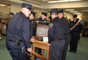A piece of steel from the World Trade Center towers wreckage is moved into Hopewell Valley Central High School.