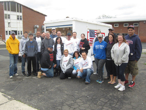 Staten Island volunteers pose at Mount Loretto in Pleasant Plains, where they spent the day packing donated supplies to send to the victims of the Oklahoma tornado. (Staten Island Advance/Virginia N. Sherry)